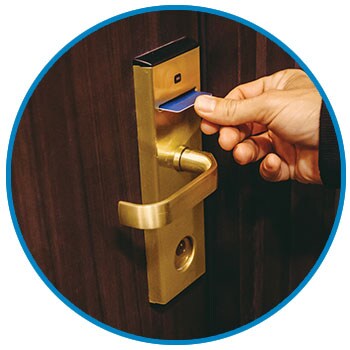 Room Key being inserted in door